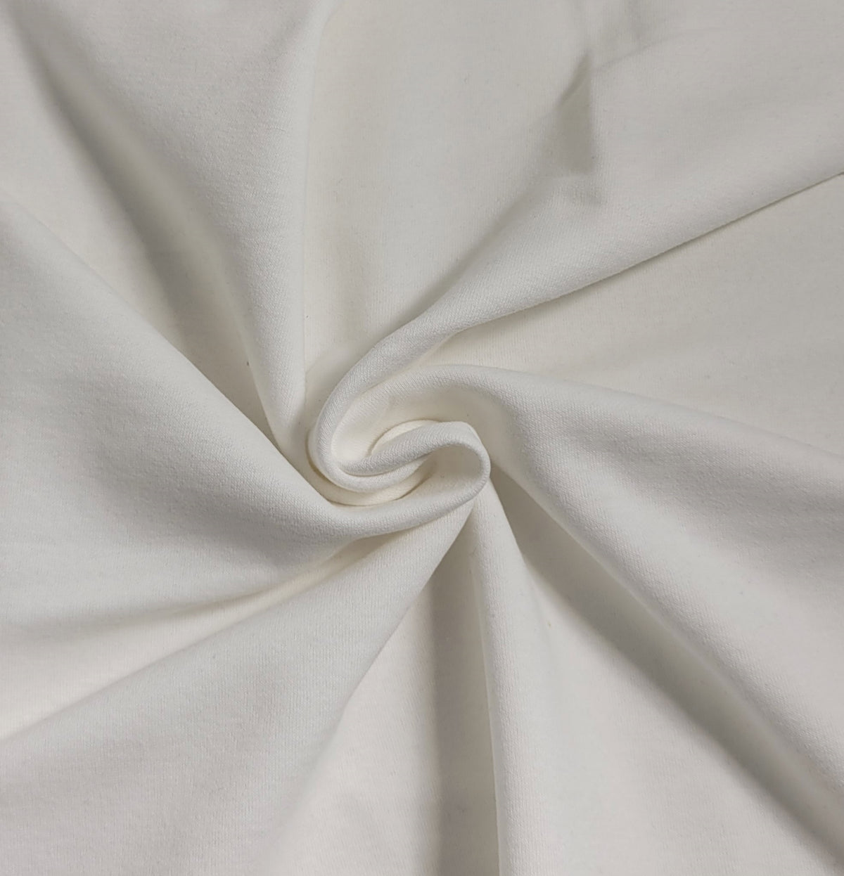 off white cotton polyester sweatshirt fleece knit fabric perfect for the winter for zip ups, kids apparel, blankets, pjs